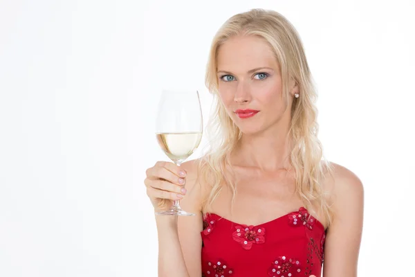 Blond mooi meisje met een glas witte wijn op Close-up — Stockfoto