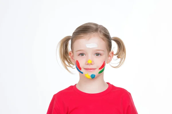 Niño pequeño con color en la mejilla — Foto de Stock