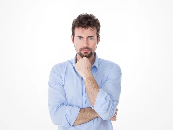 Portrait of resolute man with fist on chin — Stock Photo, Image