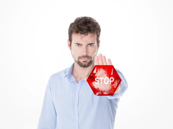 Young man doing stop gesture with his hand — Stock Photo, Image