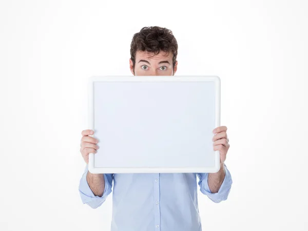 Young man with half face cover by an empty board — Stock Photo, Image