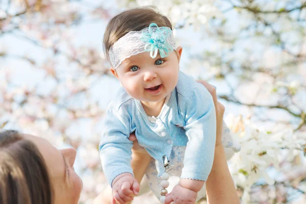 Beautiful mother posing with her little cute baby — Stock Photo, Image