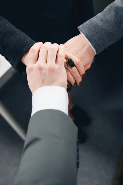 Handshake three hands of businesspeople — Stock Photo, Image