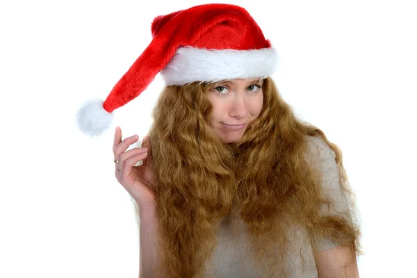 Attractive young woman with rad hair in santa hat — Stock Photo, Image