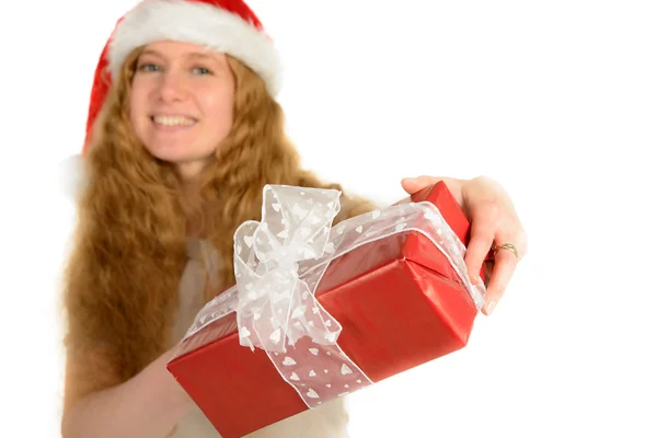 Attractive young woman with rad hair in santa hat with christmas — Stock Photo, Image