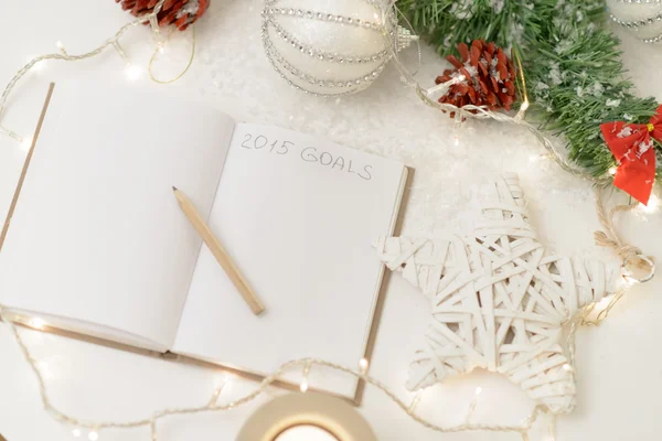 Blank notepad with a pencil,candle and new year decoration — Stock Photo, Image