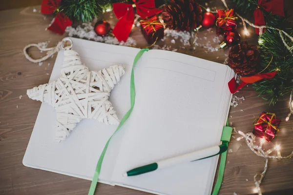 Blank notepad with a pan and new year decoration — Stock Photo, Image