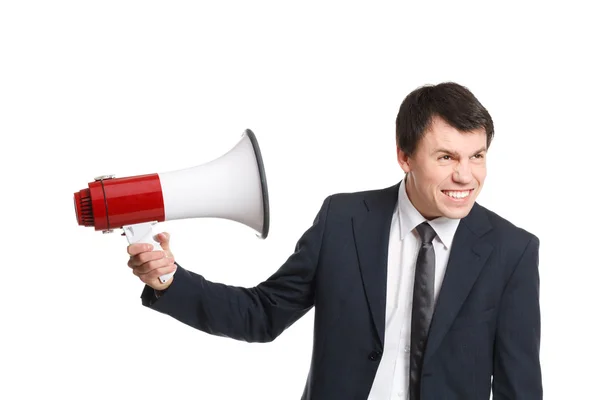 Businessman isolated on white shouts in loudspeaker — Stock Photo, Image