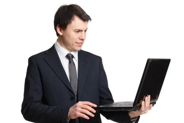 Homme d'affaires isolé sur blanc avec ordinateur portable — Photo