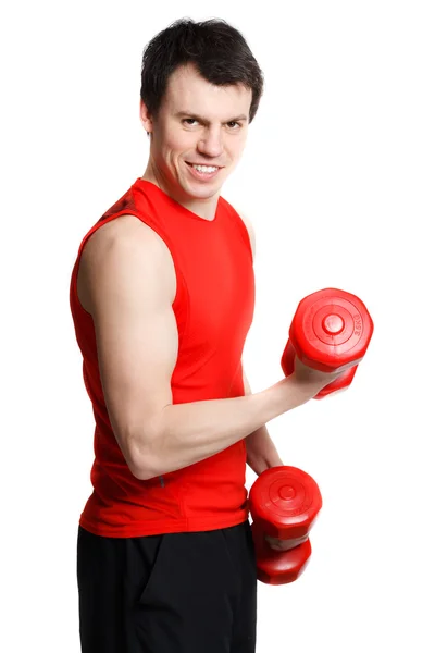 Sportos férfi kezében súlyzók — Stock Fotó