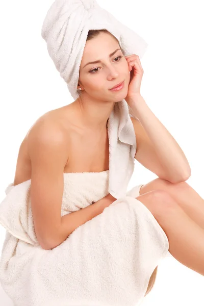 Beautiful woman in spa wrapped in towel Royalty Free Stock Images