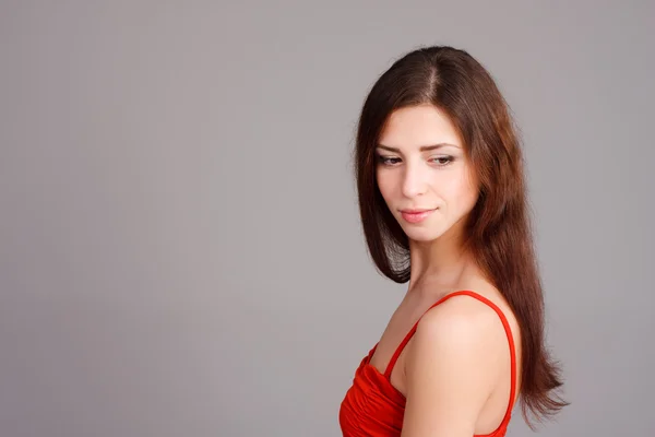 Beautiful woman in red dress — Stock Photo, Image