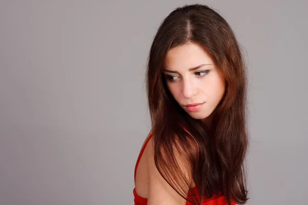 Beautiful woman in red dress — Stock Photo, Image