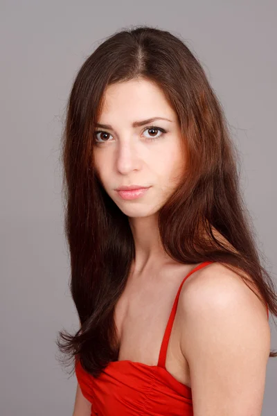 Beautiful woman in red dress — Stock Photo, Image