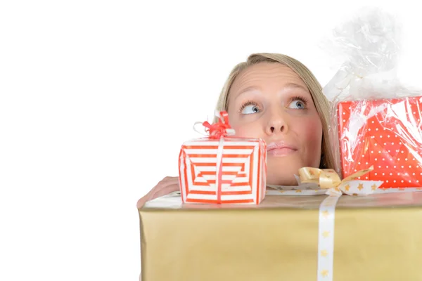 Beautiful girl with many present boxes smiles — Stock Photo, Image