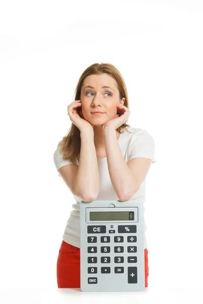 Hermosa mujer joven con calculadora grande — Foto de Stock