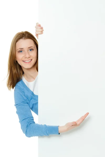 Attractive young woman with blank ad banner — Stock Photo, Image