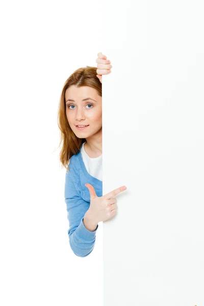Attractive young woman with blank ad banner — Stock Photo, Image