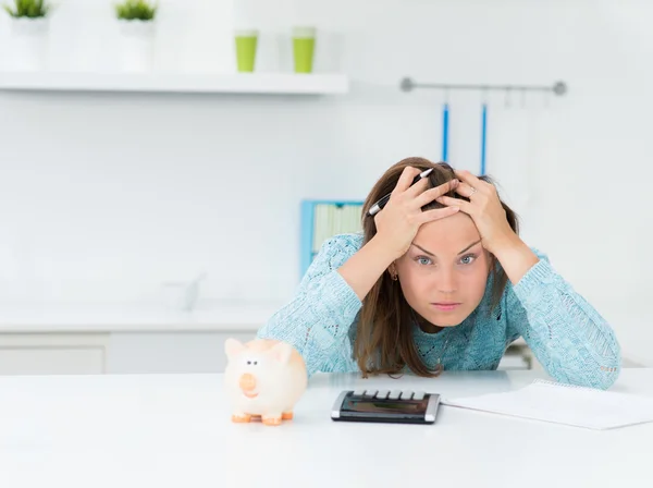 Attractive woman calculating houshold costs — Stock Photo, Image