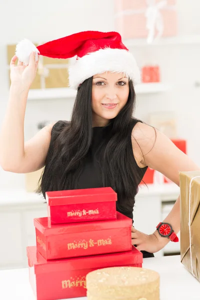 Santa girl with christmas gifts — Stock Photo, Image
