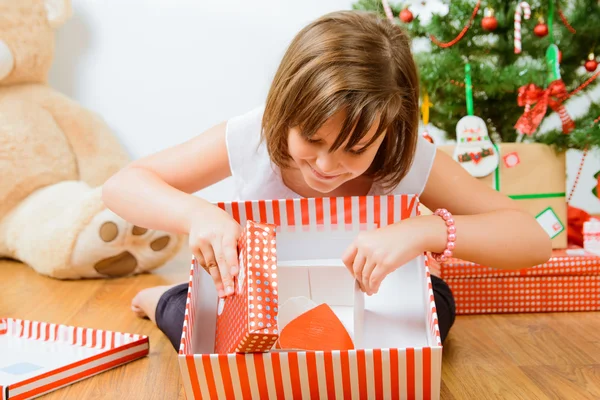 Cute girl with christmas gifts Stock Photo