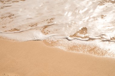 kum Plajı'nda okyanus su