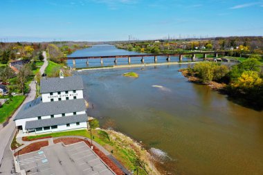 Caledonia, Ontario, Canada- May 22, 2021: An aerial of Caledonia Mill by the Grand River in Ontario, Canada