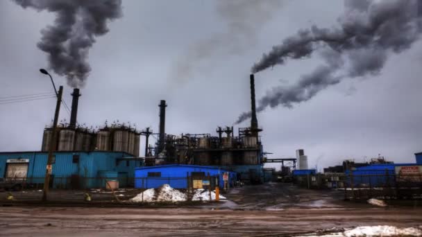 A timelapse view of smoky pollutants poring from a factory — Stock Video