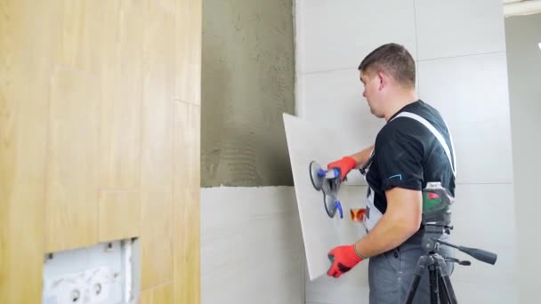 Male Worker Professional Master Laying Ceramic Tiles Wall Bathroom Portrait — Vídeo de Stock