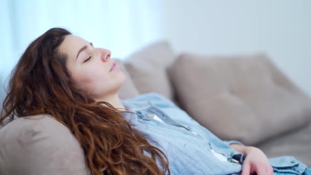 Young Woman Closed Eyes Resting Couch Attractive Adult Girl Relaxes — Stock Video