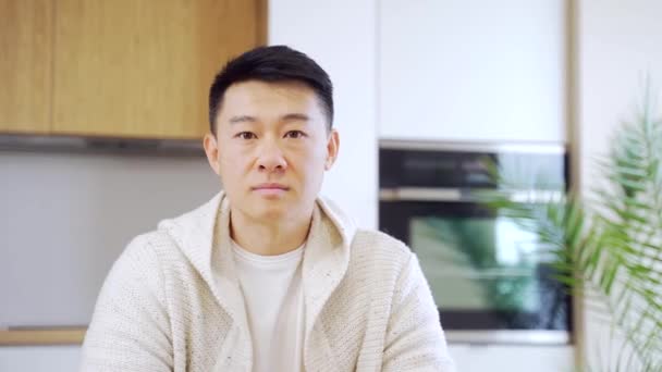Close Headshot Portrait Face Asian Man Looking Camera Indoors Face — Stock Video