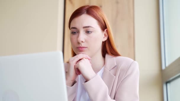 Serious Thoughtful Pensive Young Redhead Woman Sitting Office Desk Computer — Stock Video