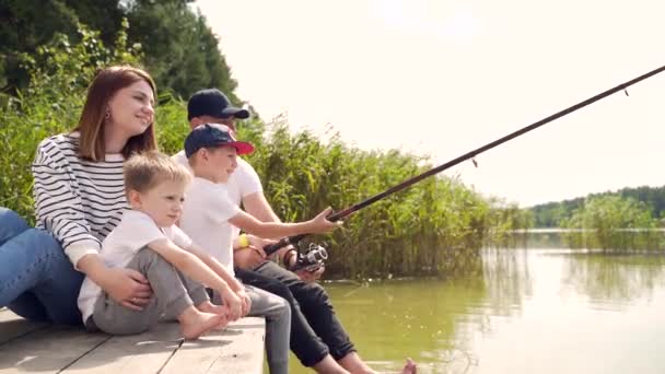 Young Happy Family Little Boy Fishing Camping Site Parents Kids — Stock Video