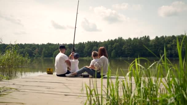 Young Happy Family Little Boy Fishing Camping Site Parents Kids — Stock Video