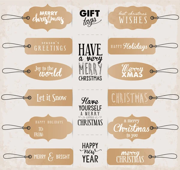 Étiquettes de cadeau de Noël calligraphiques dans le style vintage — Image vectorielle