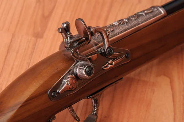 Vintage pistols on wooden background — Stock Photo, Image