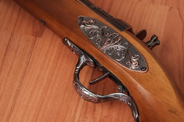 Vintage pistols on wooden background — Stock Photo, Image