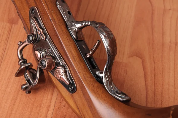 Vintage pistols on wooden background — Stock Photo, Image