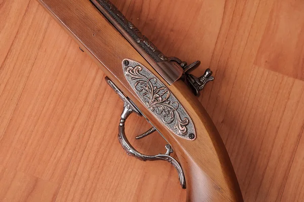 Vintage pistols on wooden background — Stock Photo, Image