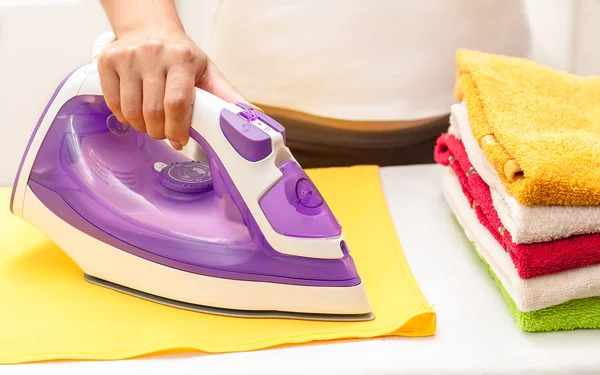 Ironing on the table at home — Stock Photo, Image
