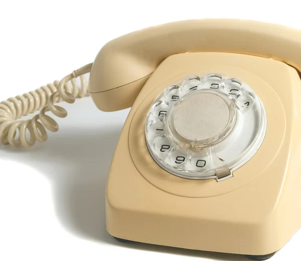 Beyaz arka plan üzerinde izole retro sarı telefon