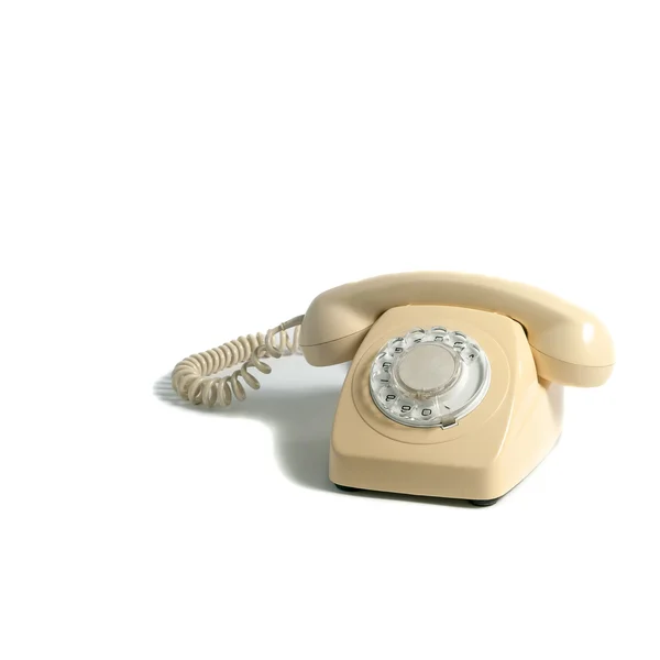 Telefone amarelo retro isolado no fundo branco — Fotografia de Stock