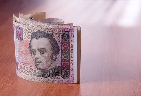 A táblázat a bank Roll az ukrán Hrivnya — Stock Fotó