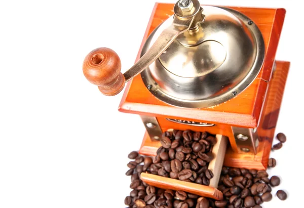 Coffee grinder with coffee beans, isolated on white — Stock Photo, Image