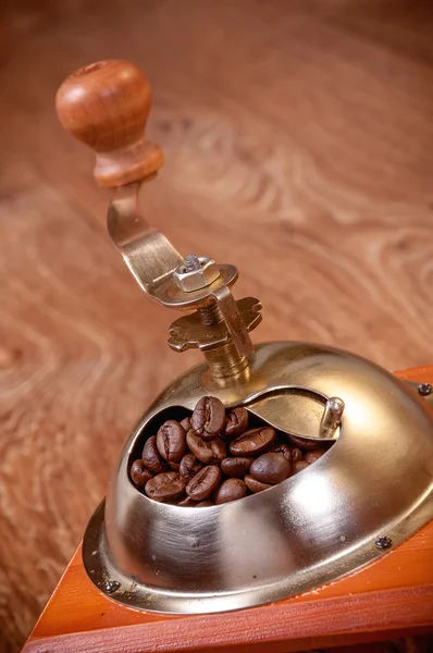 Coffee grinder and coffee beans — Stock Photo, Image