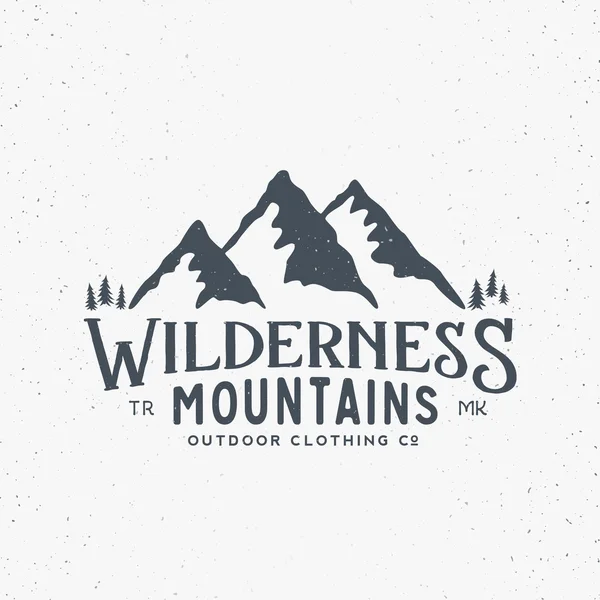 Wilderness-hegység Outdoor ruházat Vintage vektor jele, címke vagy logó sablon. Kopott textúra. Elszigetelt — Stock Vector