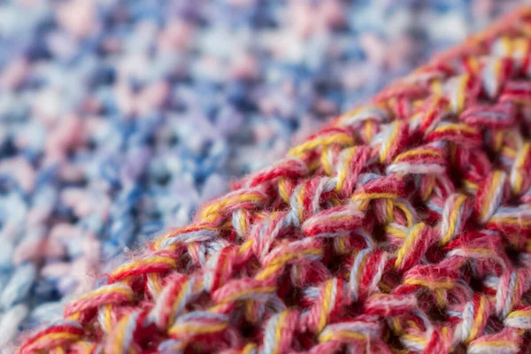 스웨터 배경의 분홍빛 노란색의 질감을 클로즈업 — 스톡 사진