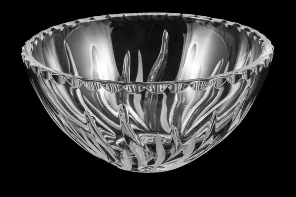 Empty crystal salad bowl on black — Stock Photo, Image