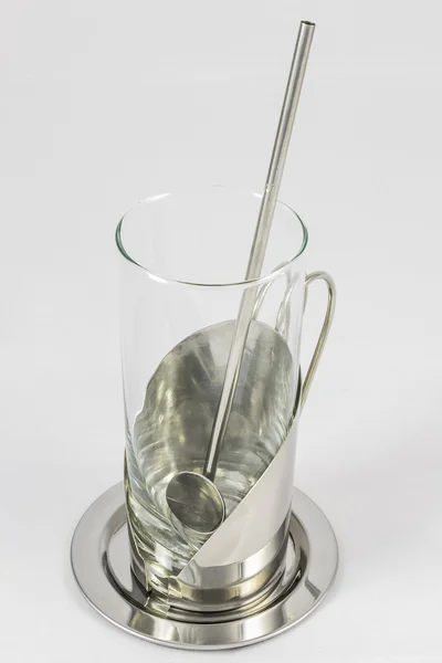 Glass with metallic glass-holder and teaspoon — Stock Photo, Image