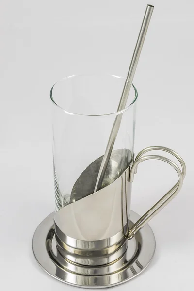 Glas med metalliskt glas-hållare och sked — Stockfoto